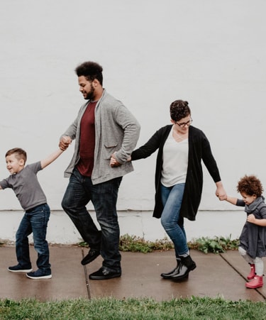 family walking in a park